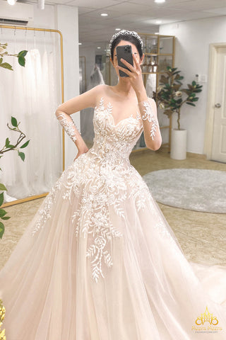 váy cưới hạ eo màu da tay dài xuyên thấu